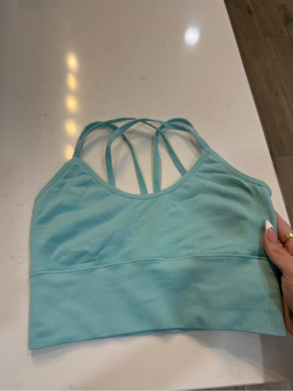 NVGTN Light Teal Strappy Sports Bra